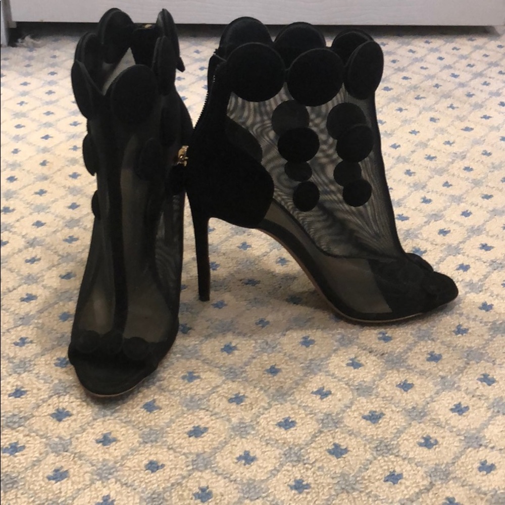 See through high healed booties in mint condition